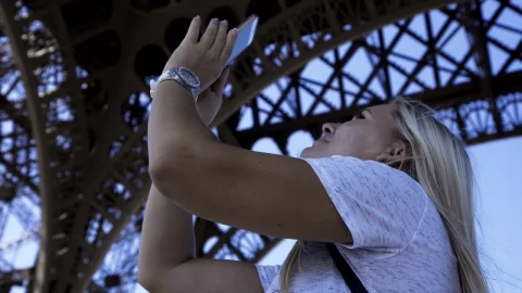 Free Video Stock tourist making a panorama below the eiffel tower Live Wallpaper - Free Live Wallpaper
