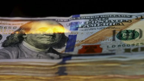 Free Video Stock tower of  dollars being burned with a flame Live Wallpaper - Free Live Wallpaper