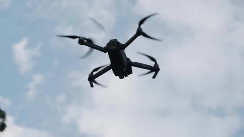 Free Video Stock tracking shot of a drone flying through the air Live Wallpaper - Free Live Wallpaper