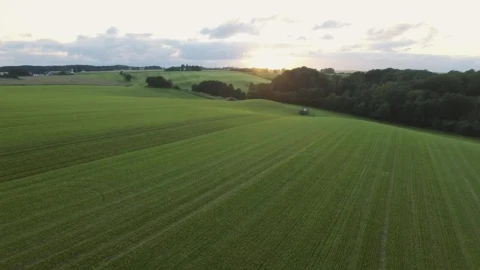 Free Video Stock tractor moving through a field Live Wallpaper - Free Live Wallpaper