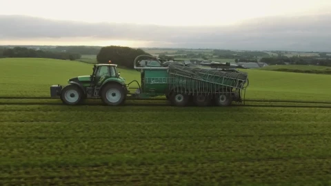 Free Video Stock tractor pulling a water tank Live Wallpaper - Free Live Wallpaper