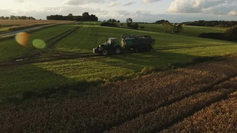 Free Video Stock tractor working in the evening Live Wallpaper - Free Live Wallpaper