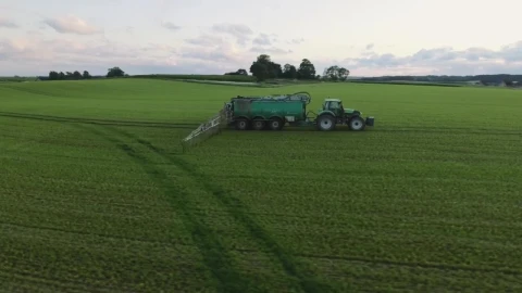 Free Video Stock tractor working on an agriculture field Live Wallpaper - Free Live Wallpaper