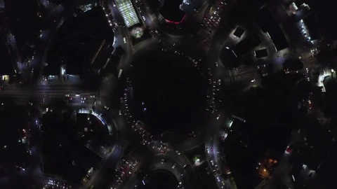 Free Video Stock traffic at a roundabout at night Live Wallpaper - Free Live Wallpaper