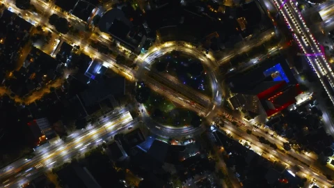 Free Video Stock traffic of a roundabout during one night Live Wallpaper - Free Live Wallpaper