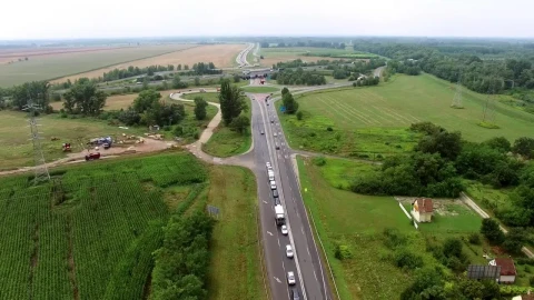 Free Video Stock traffic on a highway going through the countryside Live Wallpaper - Free Live Wallpaper