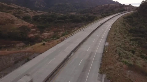 Free Video Stock traffic on the highway between the hills Live Wallpaper - Free Live Wallpaper