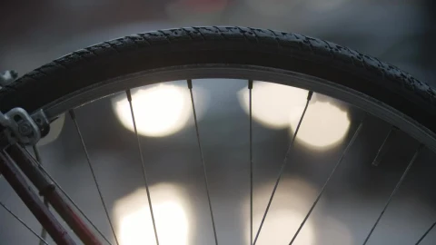 Free Video Stock traffic through a bike wheel Live Wallpaper - Free Live Wallpaper