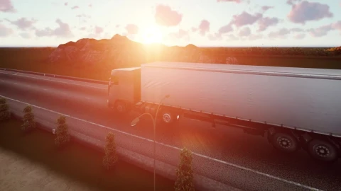 Free Video Stock trailer traveling on a road at sunset in d Live Wallpaper - Free Live Wallpaper