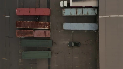 Free Video Stock trailers parked outside a warehouse Live Wallpaper - Free Live Wallpaper