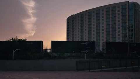 Free Video Stock train carriages moving forward in a city at sunset Live Wallpaper - Free Live Wallpaper