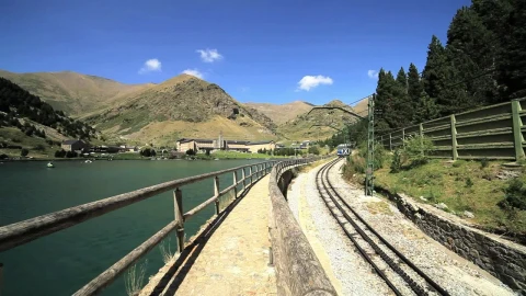 Free Video Stock train passing next to a river in the countryside Live Wallpaper - Free Live Wallpaper