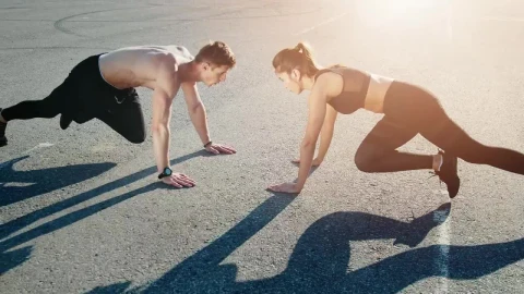 Free Video Stock trainer motivates man during outdoor workout Live Wallpaper - Free Live Wallpaper