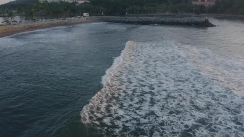 Free Stock Video Waves With Surfers Reaching A Beach Live Wallpaper - Free Live Wallpaper
