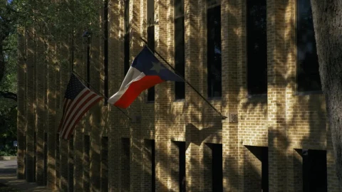 Free Stock Video Wall Of A Buildings With American And Texas Flags Live Wallpaper - Free Live Wallpaper
