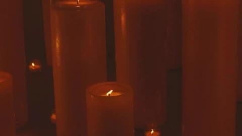 Free Stock Video Very Large And Very Small Candles Lit In The Dark Live Wallpaper - Free Live Wallpaper