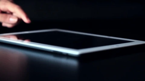 Free Stock Video Using A Tablet On A Dark Table Live Wallpaper - Free Live Wallpaper