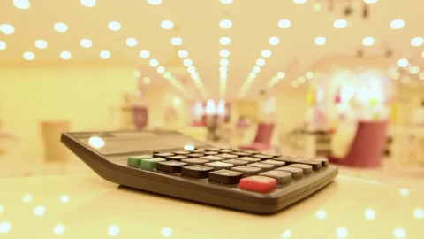 Free Stock Video Typing In A Calculator In A Department Store Live Wallpaper - Free Live Wallpaper