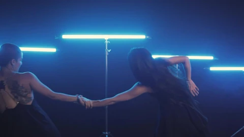 Free Stock Video Two Women Dancing Illuminated With Blue Light Bars Live Wallpaper - Free Live Wallpaper