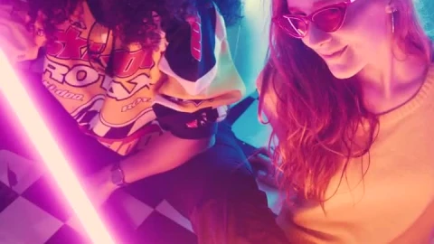 Free Stock Video Two Stylish Girls Surrounded By Bars Of Light Live Wallpaper - Free Live Wallpaper