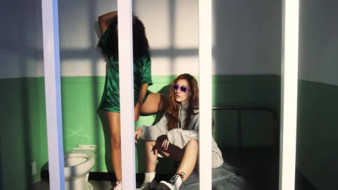 Free Stock Video Two Stylish Friends Incarcerated After A Night Out Live Wallpaper - Free Live Wallpaper