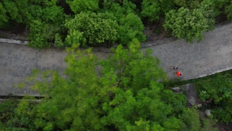 Free Stock Video Two People Walking Down A Road Seen From Above Live Wallpaper - Free Live Wallpaper