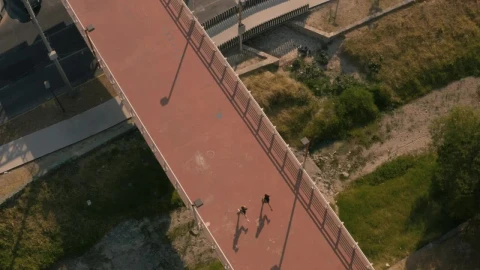 Free Stock Video Two People Jogging Across A Footbridge Live Wallpaper - Free Live Wallpaper