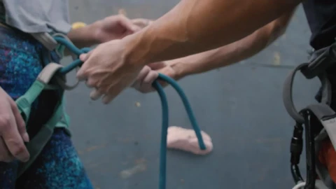 Free Stock Video Two People Adjusting Harnesses On Their Body Live Wallpaper - Free Live Wallpaper