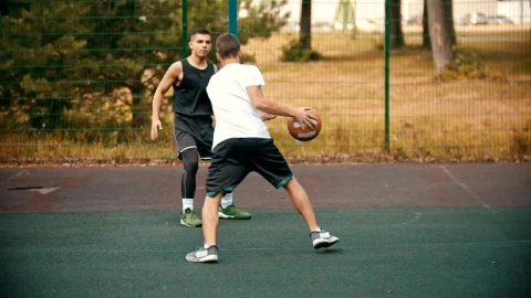 Free Stock Video Two Men Playing Basketball In A Park Live Wallpaper - Free Live Wallpaper