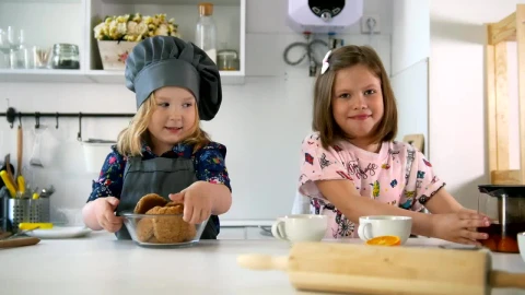 Free Stock Video Two Girls After Successfully Baking Cookies Live Wallpaper - Free Live Wallpaper