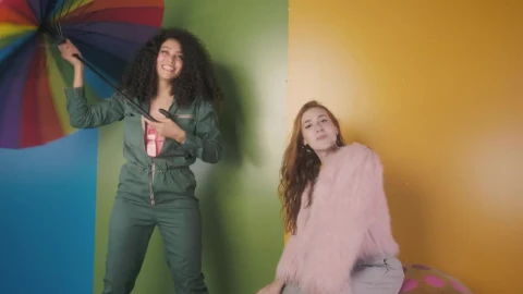 Free Stock Video Two Funny Girls Dancing On Colorful Background Live Wallpaper - Free Live Wallpaper