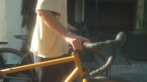 Free Stock Video Two Cyclists Walking Down The Street Live Wallpaper - Free Live Wallpaper