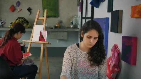 Free Stock Video Two Artist Girls Working In An Artistic Workshop Live Wallpaper - Free Live Wallpaper