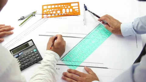 Free Stock Video Two Architects Working On An Architectural Plan Live Wallpaper - Free Live Wallpaper