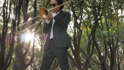 Free Stock Video Trombone Musician In The Middle Of Nature Live Wallpaper - Free Live Wallpaper