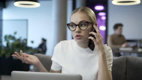 Free Stock Video Young Woman With Glasses Talking On The Phone Live Wallpaper - Free Live Wallpaper