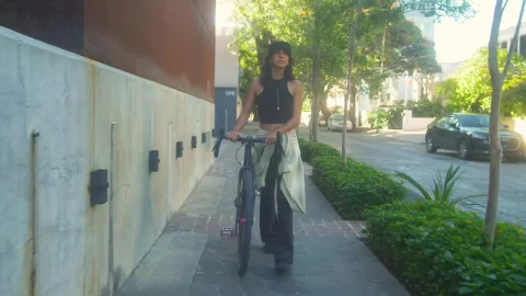 Free Stock Video Young Woman Walking With Her Bicycle Live Wallpaper - Free Live Wallpaper