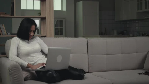 Free Stock Video Young Woman Using Laptop In The Couch Live Wallpaper - Free Live Wallpaper