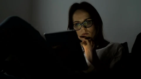 Free Stock Video Young Woman Using A Tablet In A Dark Room Live Wallpaper - Free Live Wallpaper