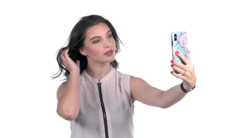Free Stock Video Young Woman Takes Selfies With A Smartphone Live Wallpaper - Free Live Wallpaper