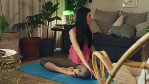 Free Stock Video Young Woman Stretching Her Body In Her Living Room Live Wallpaper - Free Live Wallpaper