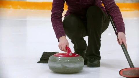 Free Stock Video Young Woman Playing Curling On An Ice Rink Live Wallpaper - Free Live Wallpaper
