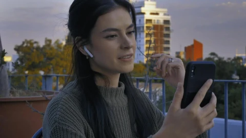 Free Stock Video Young Woman On A Terrace Having A Video Call Live Wallpaper - Free Live Wallpaper