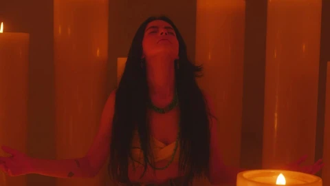 Free Stock Video Young Woman Meditating Among Many Huge Candles Live Wallpaper - Free Live Wallpaper