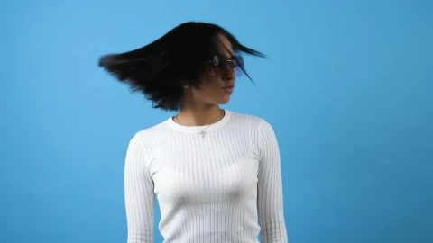 Free Stock Video Young Woman Dancing On A Blue Background Live Wallpaper - Free Live Wallpaper