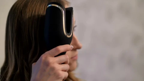 Free Stock Video Young Woman Curling Her Hair Live Wallpaper - Free Live Wallpaper