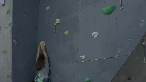 Free Stock Video Young Woman Climbing A Big Tower In An Aerial View Live Wallpaper - Free Live Wallpaper