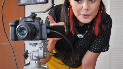 Free Stock Video Young Woman Behind The Camera Recording A Boy Live Wallpaper - Free Live Wallpaper
