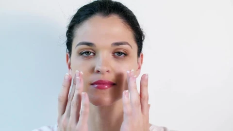 Free Stock Video Young Woman Applying Skin Care Cream On Face Live Wallpaper - Free Live Wallpaper