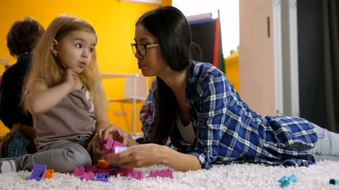 Free Stock Video Young Teacher Playing With Legos With Her Students Live Wallpaper - Free Live Wallpaper